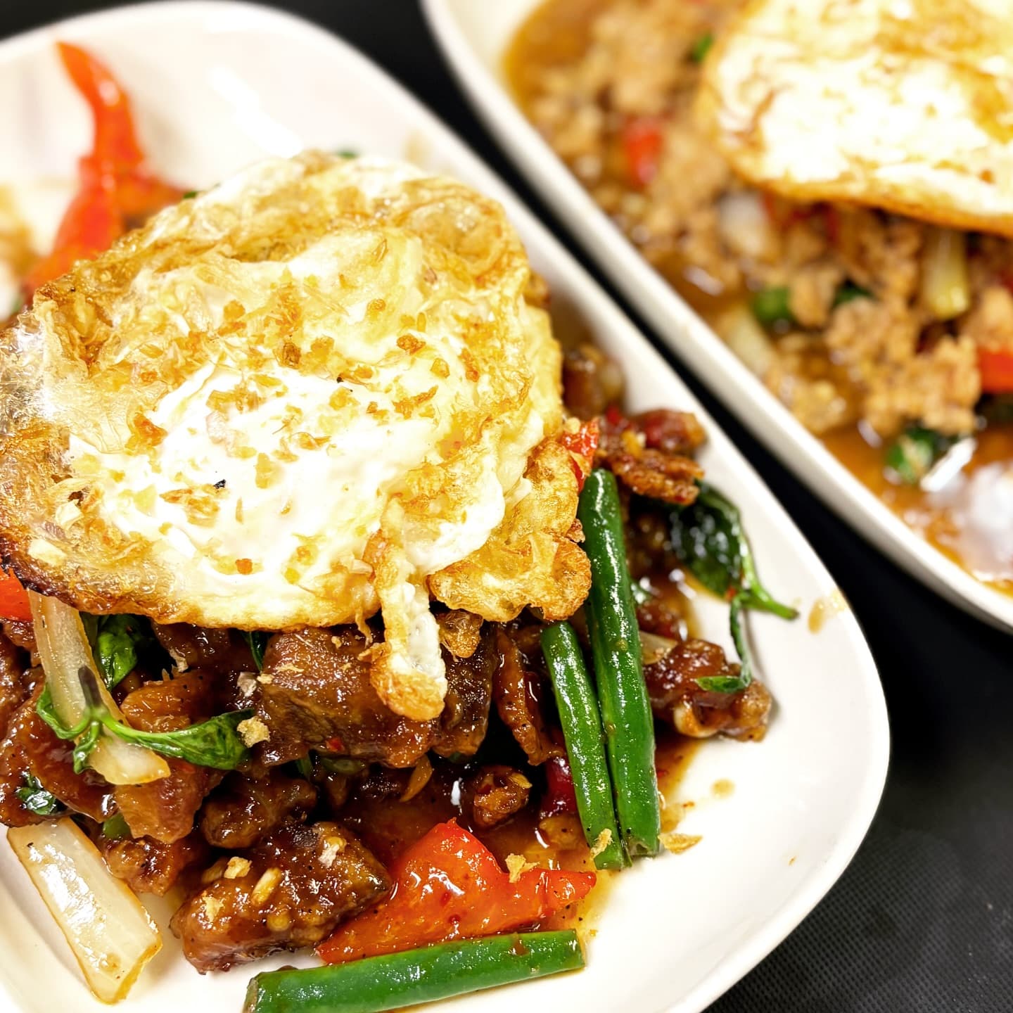 Catering spread featuring Thai, Lao and Khmer dishes